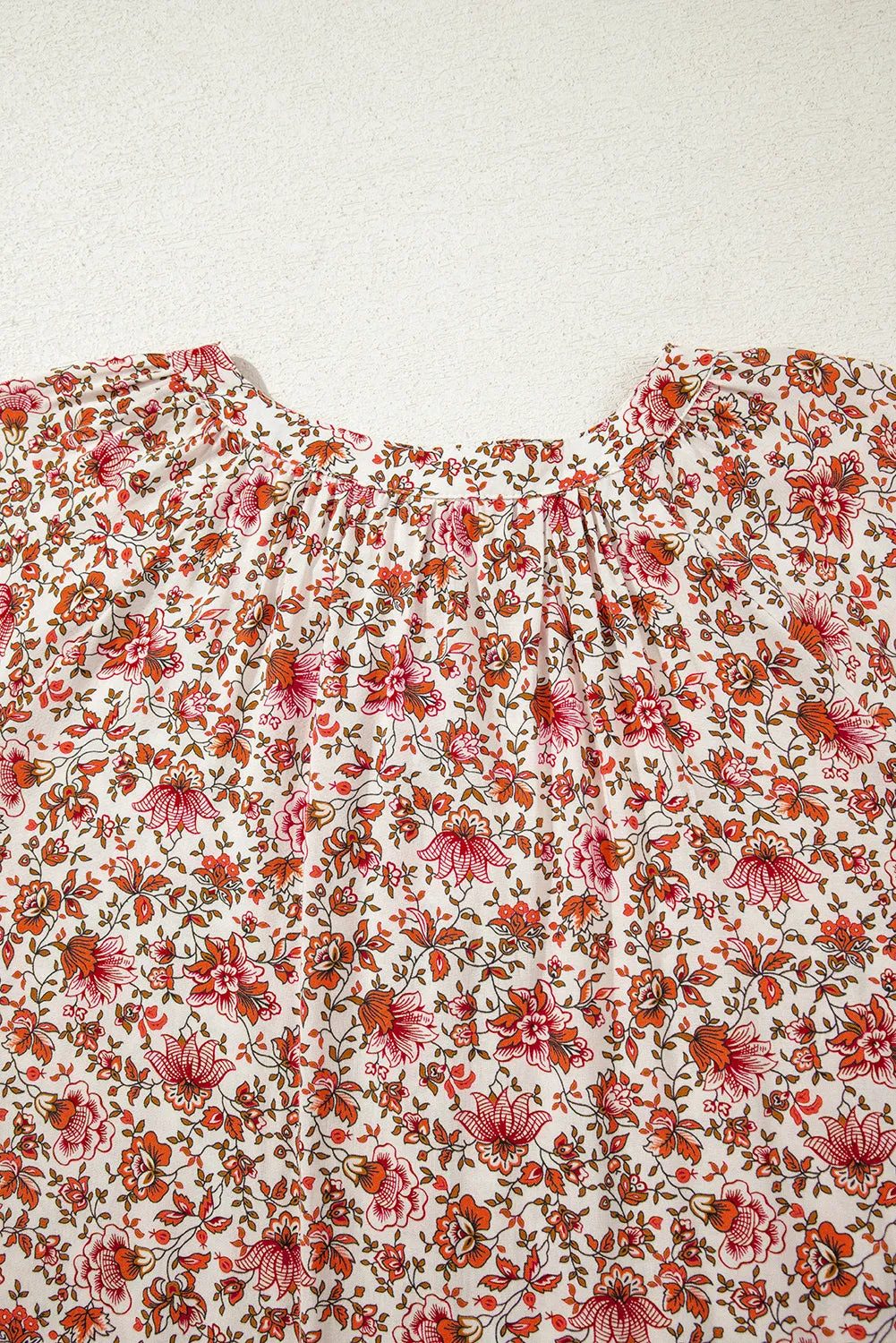 Red Floral Print Pleated Detail Notched Neck Puff Sleeve Blouse sold by Beagle Boutique product image thumbnail 4