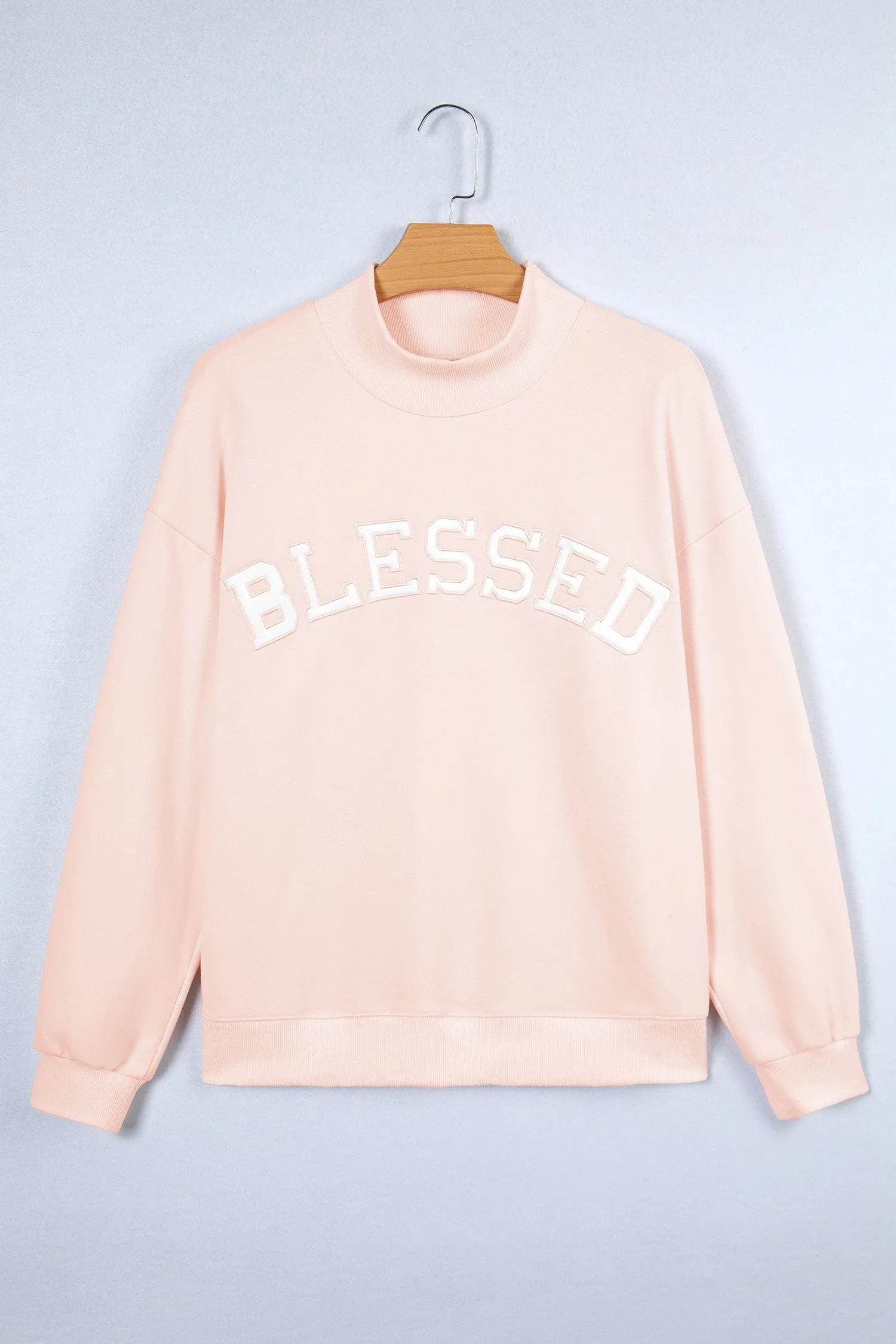 Oversized 'Blessed' Embroidered Mock Neck Sweatshirt sold by Beagle Boutique