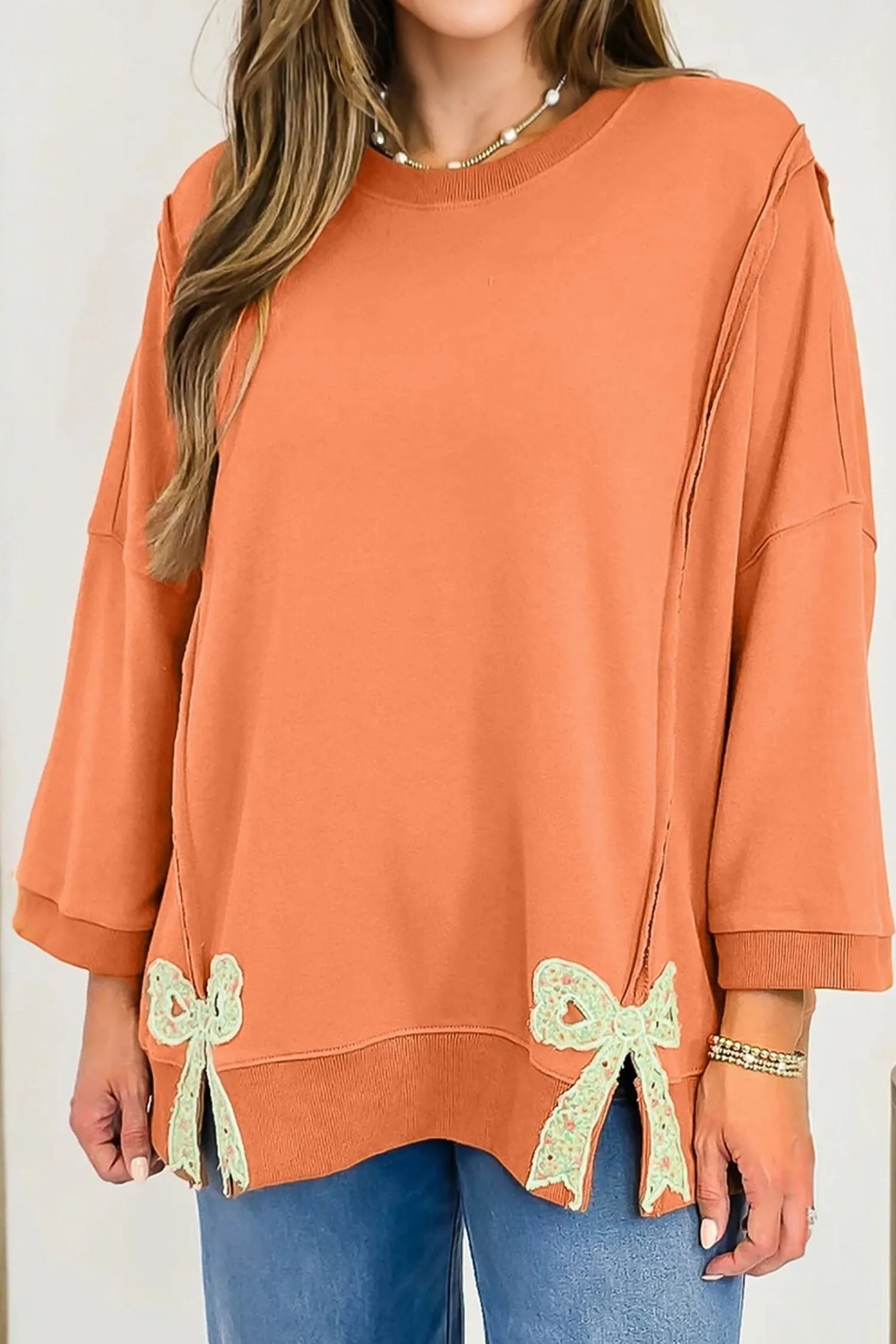 Floral Bow Patched Exposed Seam Oversized Sweatshirt sold by Beagle Boutique product image thumbnail 2