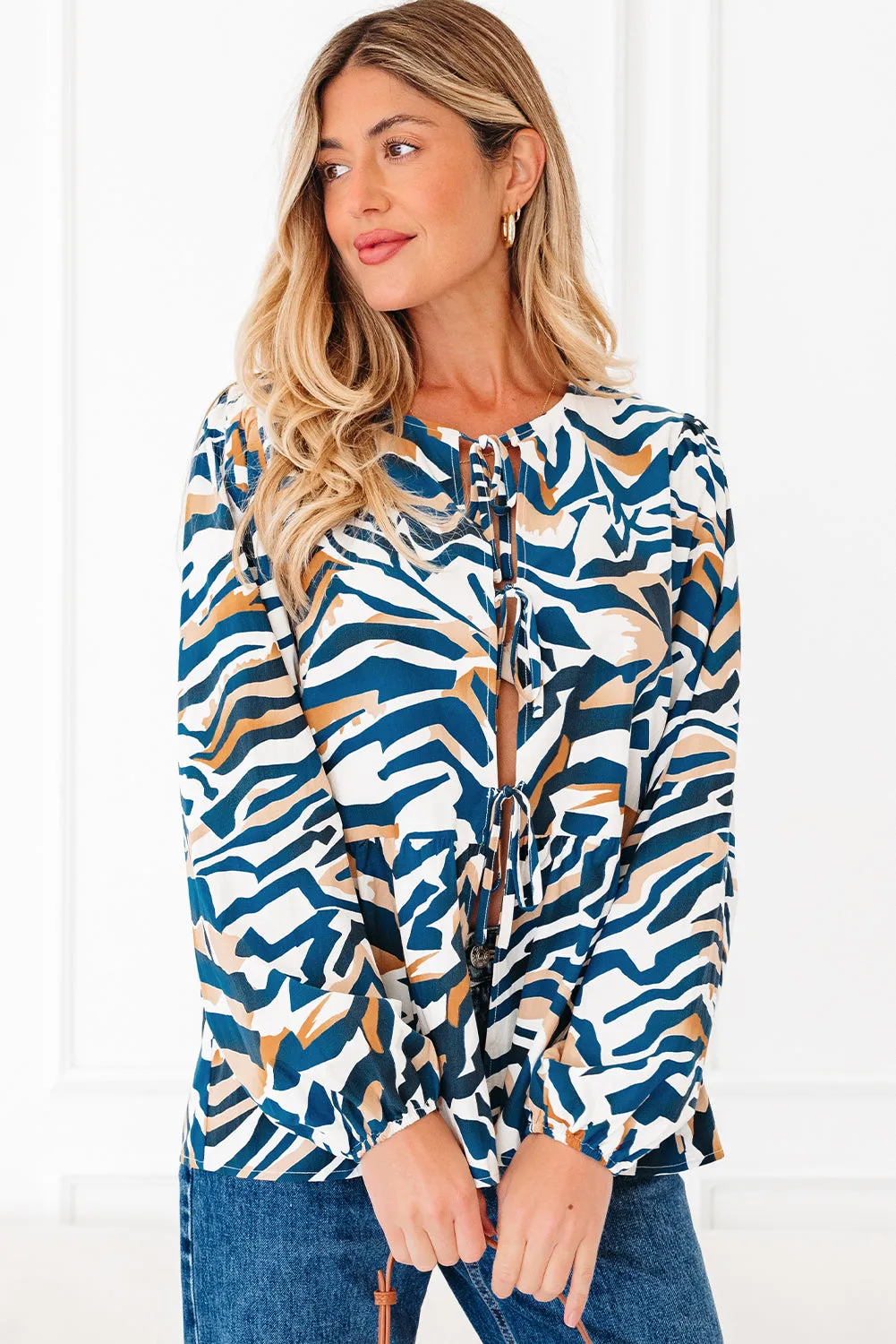 Zebra Print Tied Front Puff Sleeve Top sold by Beagle Boutique product image thumbnail 2