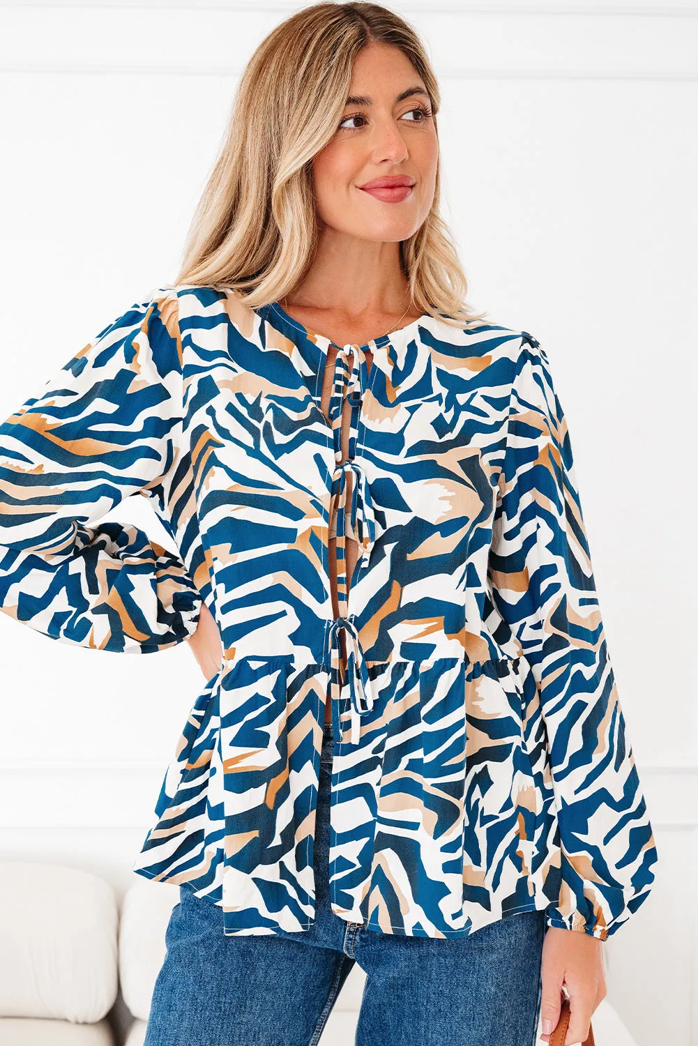 Zebra Print Tied Front Puff Sleeve Top sold by Beagle Boutique product image thumbnail 5