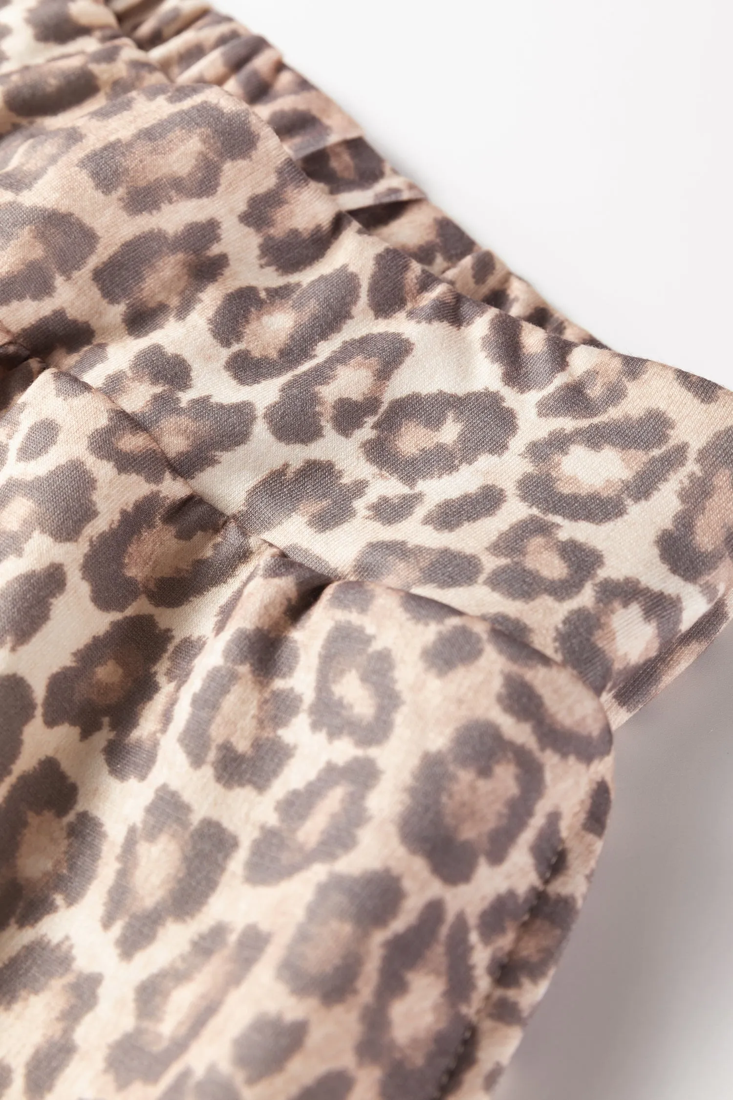 Leopard Print V-Neck Pullover Mini Skirt Co-ord Set sold by Beagle Boutique product image thumbnail 5