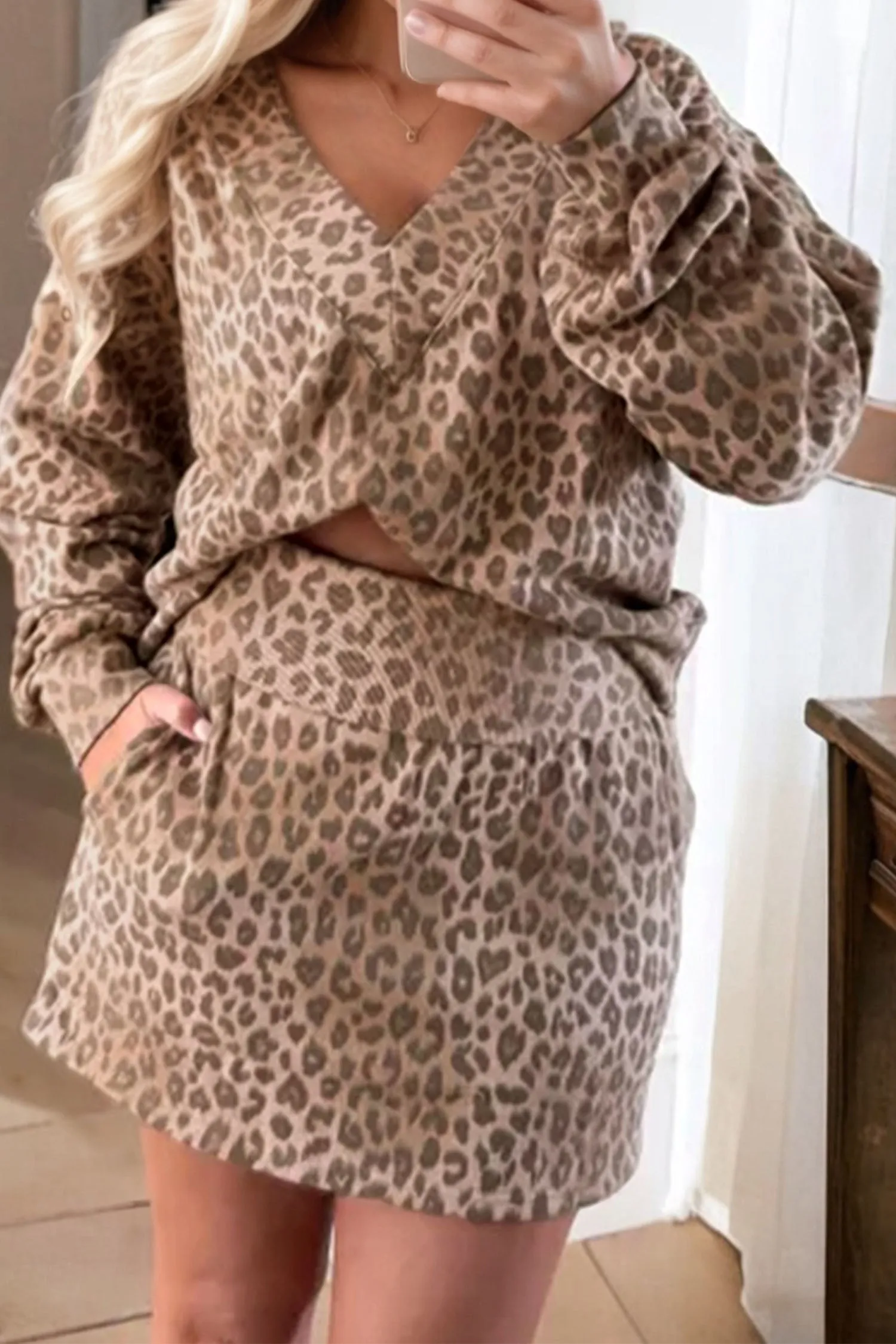 Leopard Print V-Neck Pullover Mini Skirt Co-ord Set sold by Beagle Boutique product image thumbnail 2