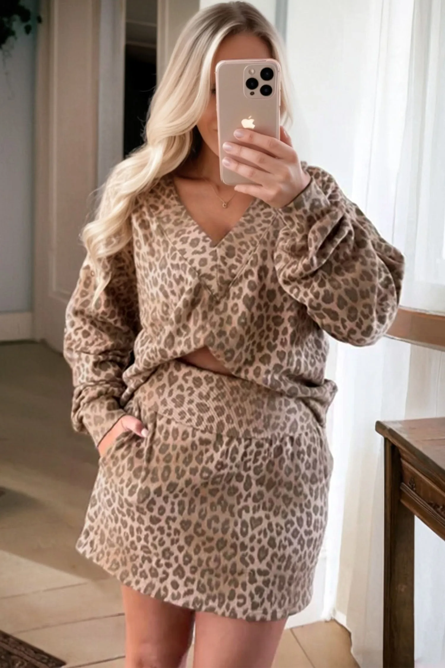 Leopard Print V-Neck Pullover Mini Skirt Co-ord Set sold by Beagle Boutique product image thumbnail 3