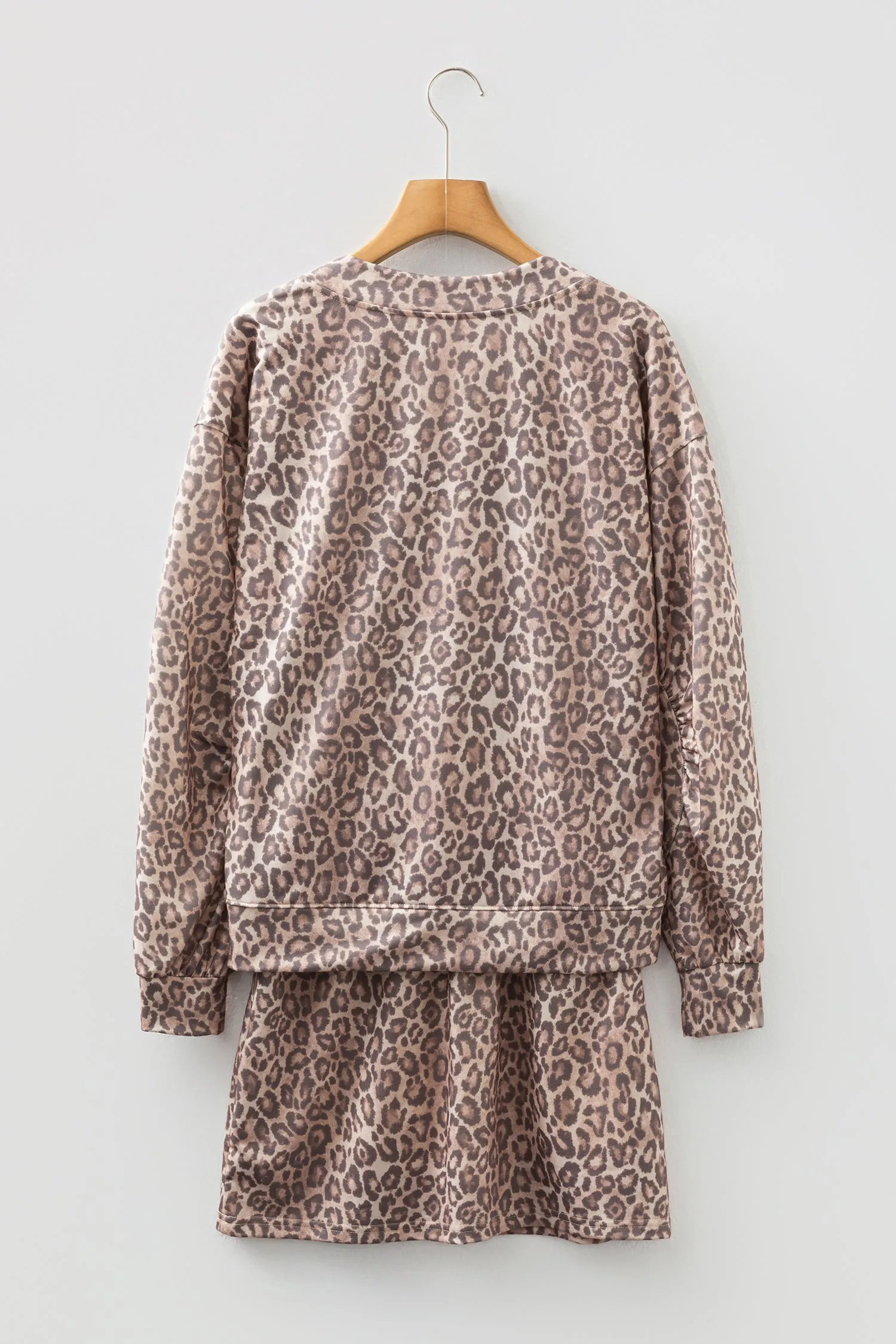 Leopard Print V-Neck Pullover Mini Skirt Co-ord Set sold by Beagle Boutique product image thumbnail 4