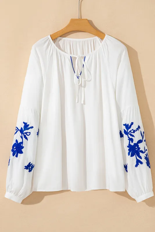 Floral Embroidered Drawstring V-Neck Blouse sold by Beagle Boutique