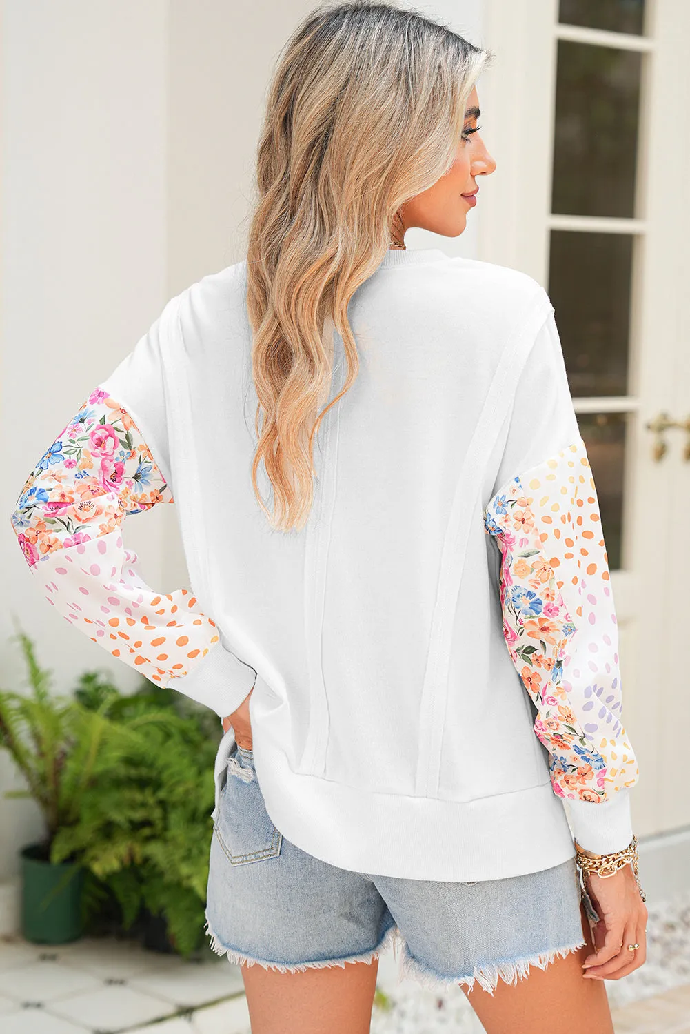 White Floral Dotted Print Patchwork Sleeve High Low Sweatshirt sold by Beagle Boutique product image thumbnail 2