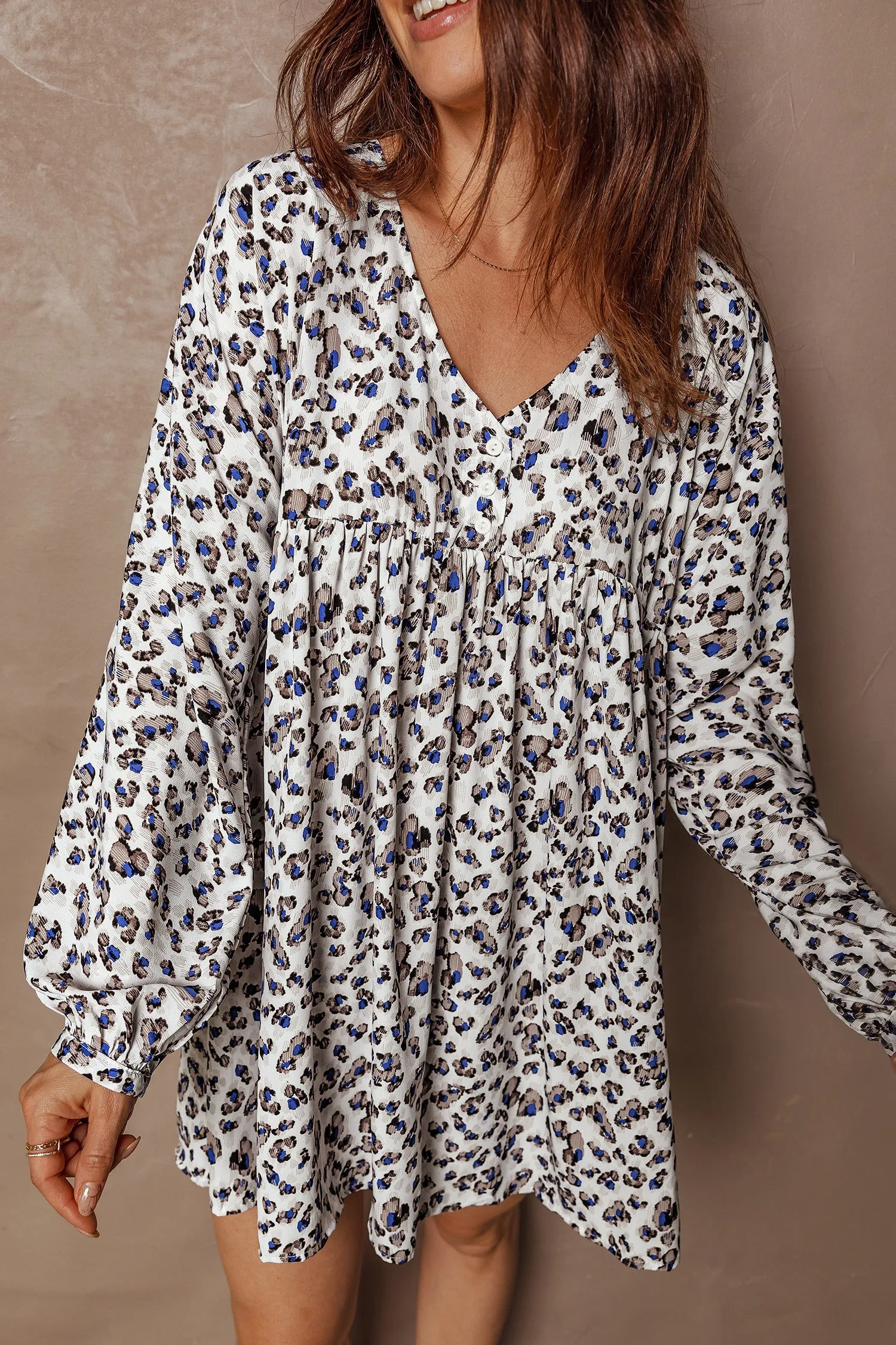 Multicolour Leopard Print V-Neck Button Detail Long Sleeve Mini Dress sold by Beagle Boutique