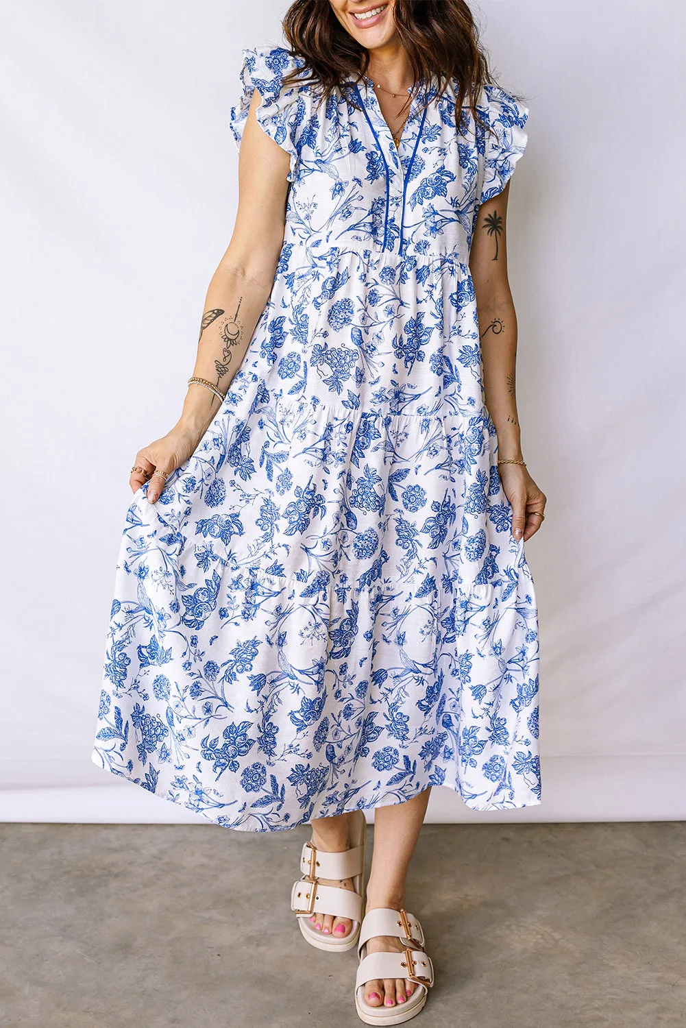 Blue Ruffled Short Sleeve Tiered Floral Midi Dress sold by Beagle Boutique