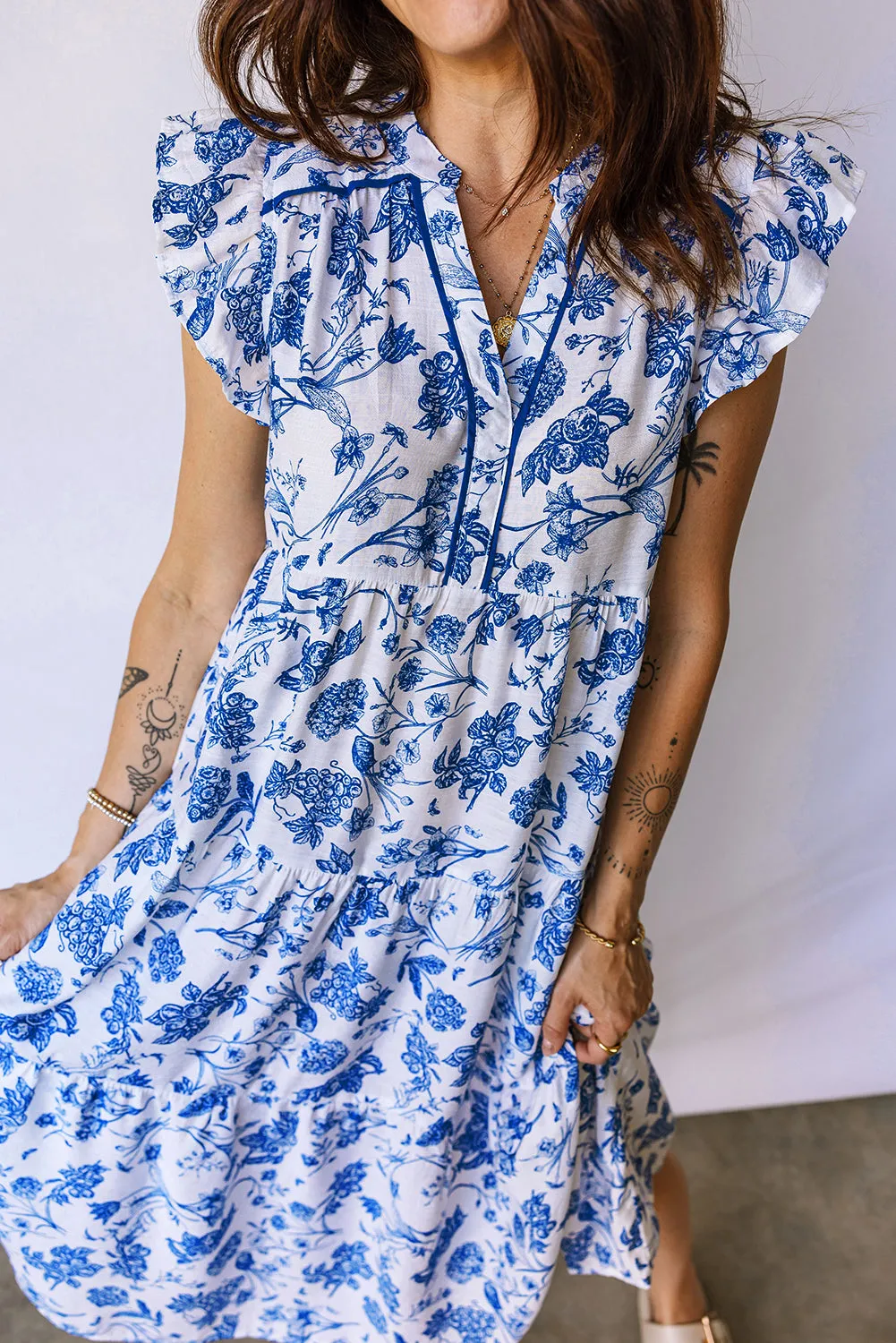 Blue Ruffled Short Sleeve Tiered Floral Midi Dress sold by Beagle Boutique product image thumbnail 5