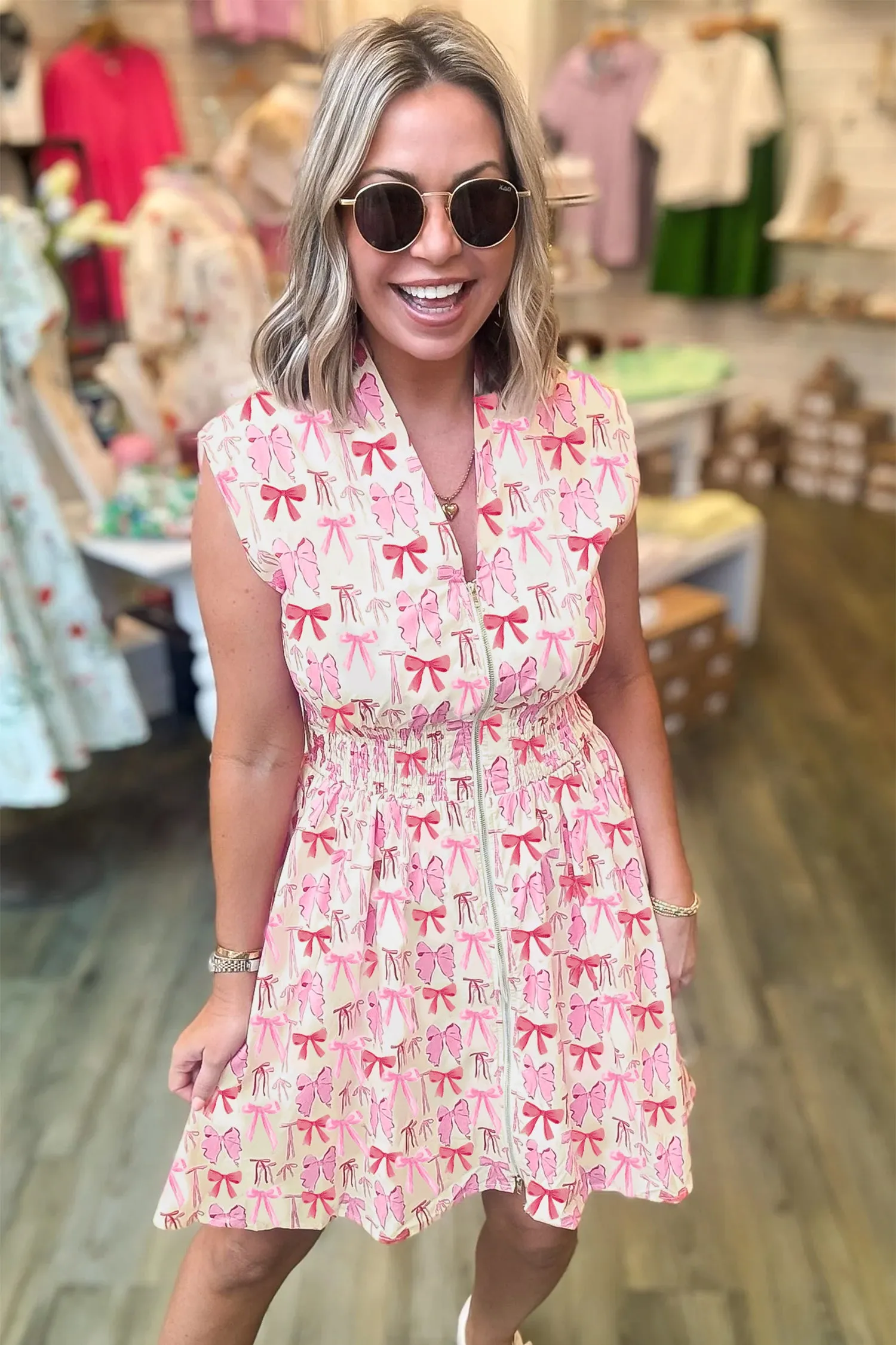 Pink Full Zip Cinched Waist Sleeveless Bow Mini Dress sold by Beagle Boutique product image thumbnail 2