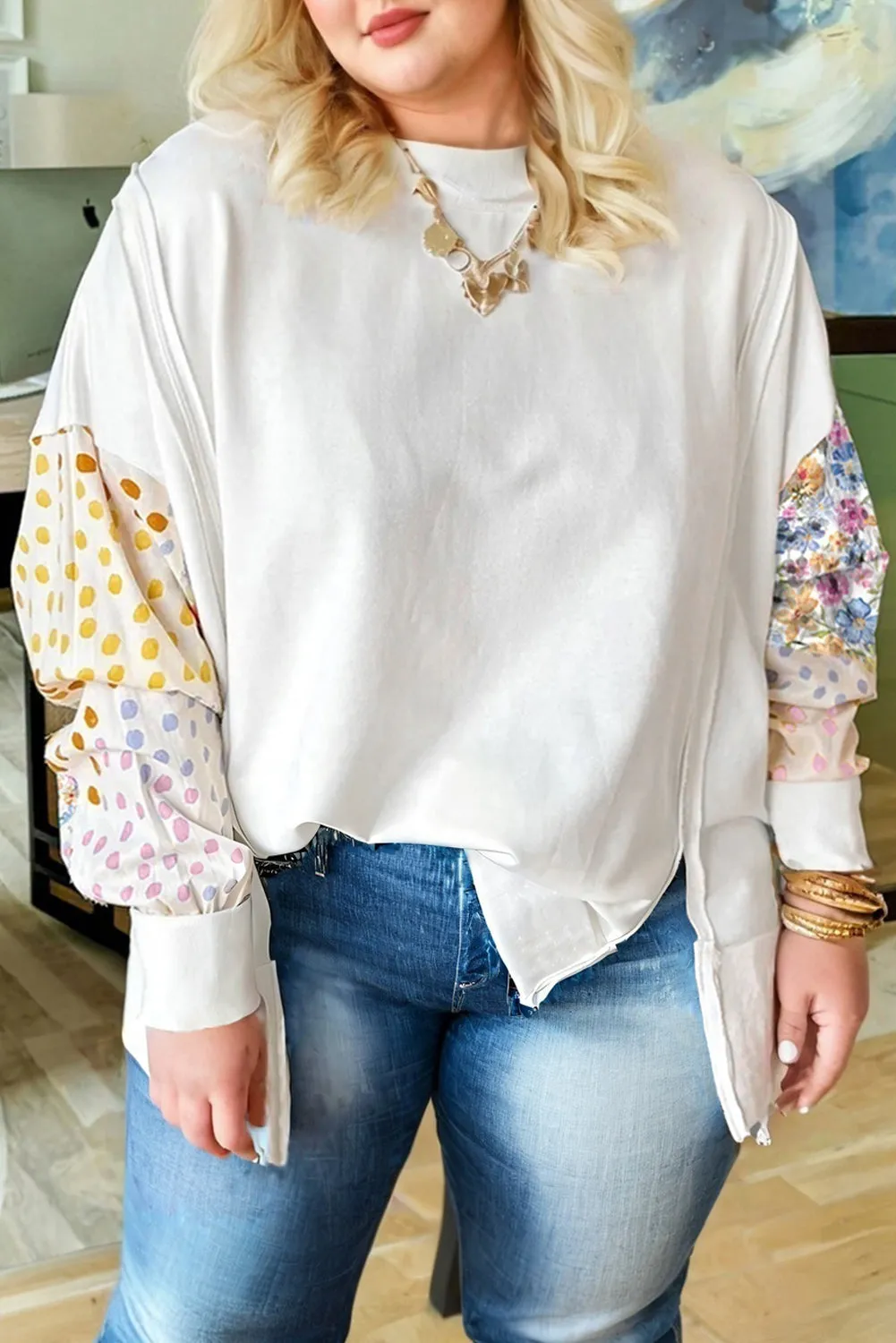 Plus Size Exposed Seam Detail Contrast Dot Floral Patchwork Sleeve Sweatshirt sold by Beagle Boutique product image thumbnail 2