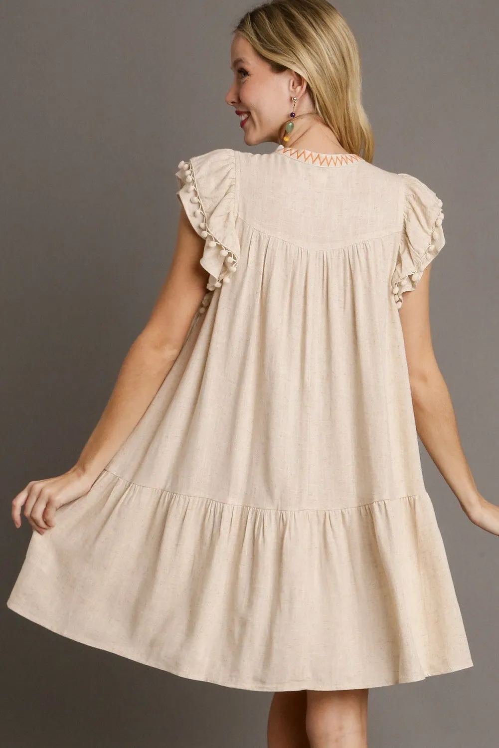 Embroidery Split Neck Pom Pom Ruffle Sleeve Short Dress sold by Beagle Boutique product image thumbnail 2