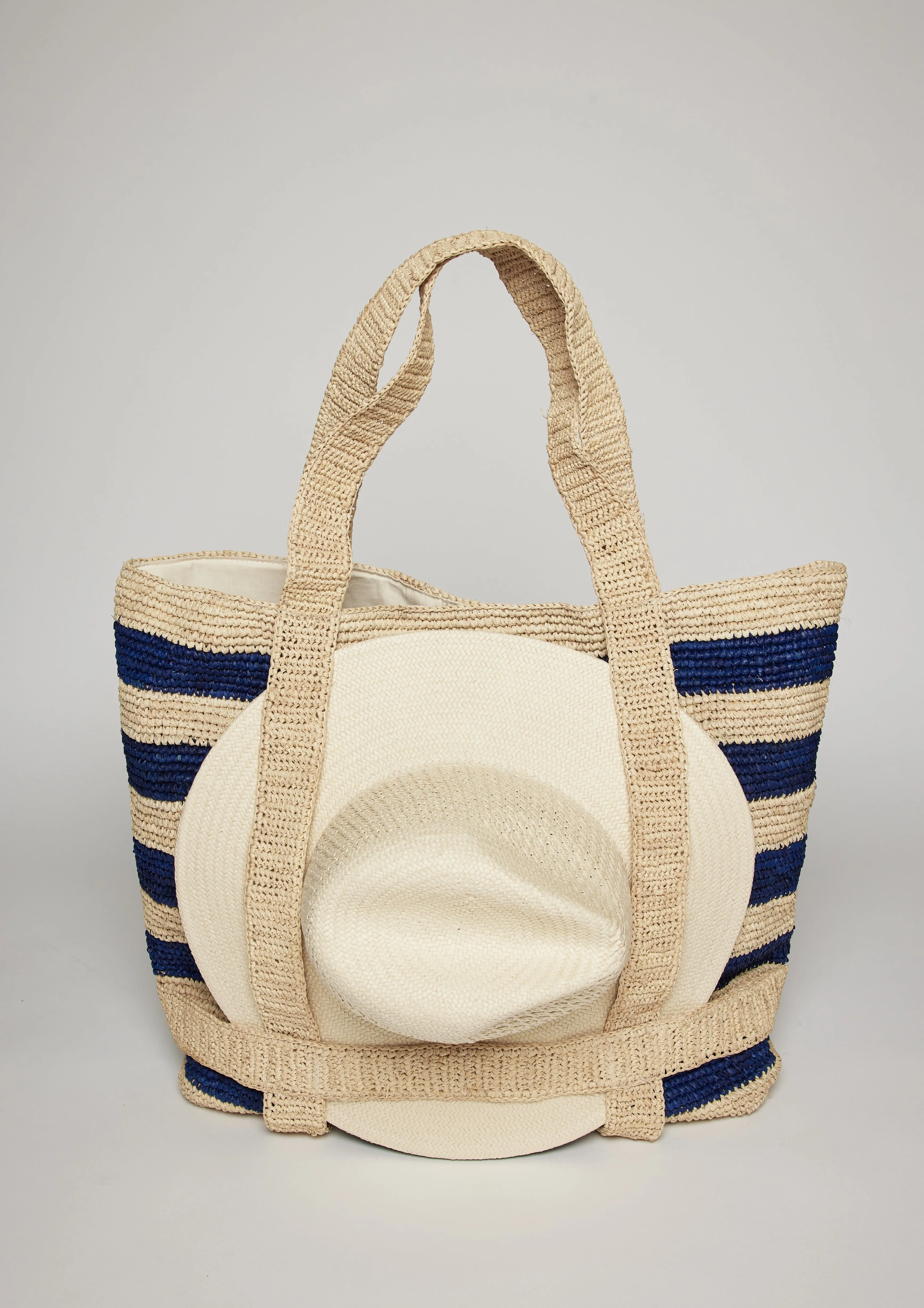 The Original Straw Traveler Bag sold by Hat Attack