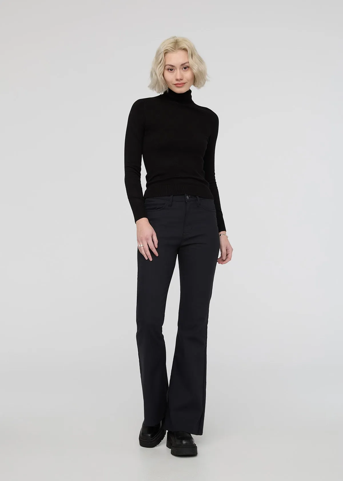 NuStretch High Rise Flare - Black sold by DUER