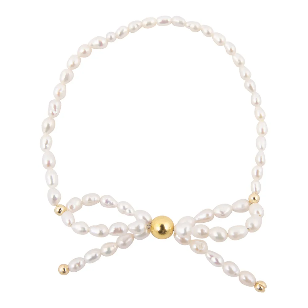 White Freshwater Pearl Bow Stretch Bracelet sold by Barse