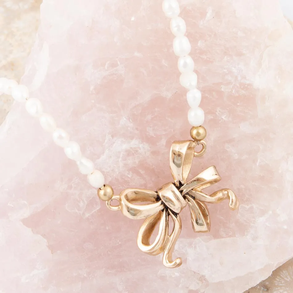 Gifted Freshwater White Pearl Golden Bow Pendant Necklace sold by Barse product image thumbnail 2