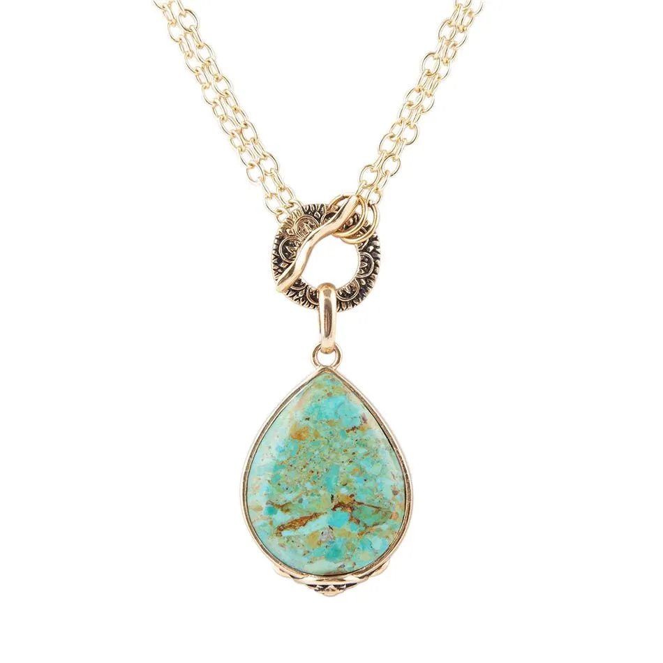 Abby Blue Turquoise and Golden Bronze Pendant Necklace sold by Barse