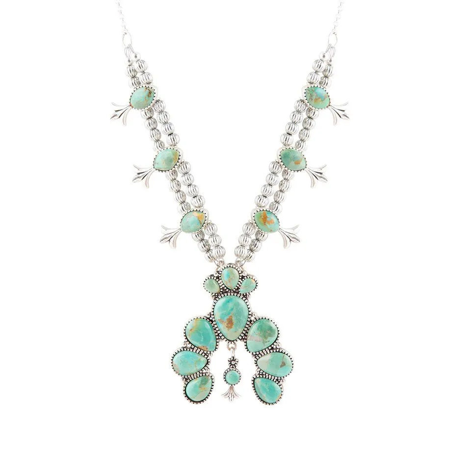 Squash Blossom Statement Blue Turquoise and Sterling Silver Necklace sold by Barse
