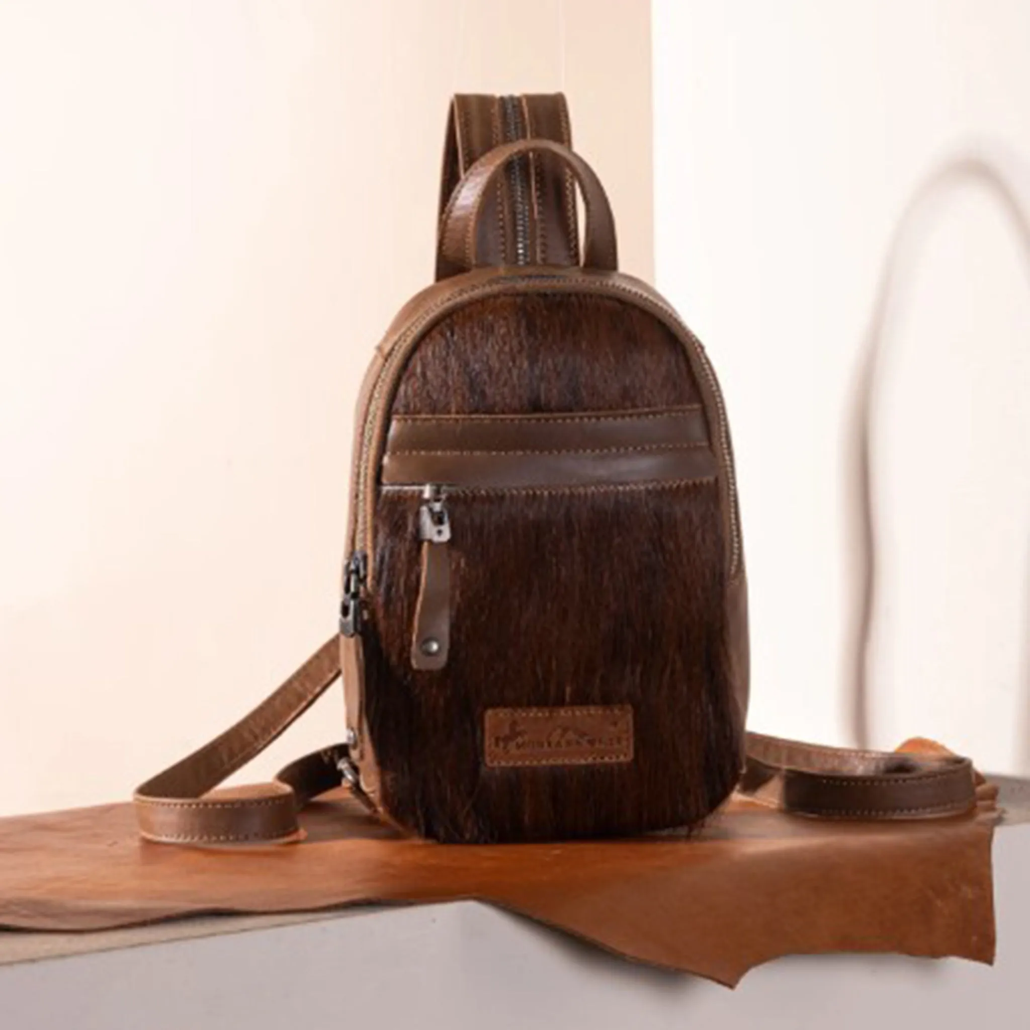 Wrangler Hair-on Cowhide Convertible Sling Bag sold by Western Edge