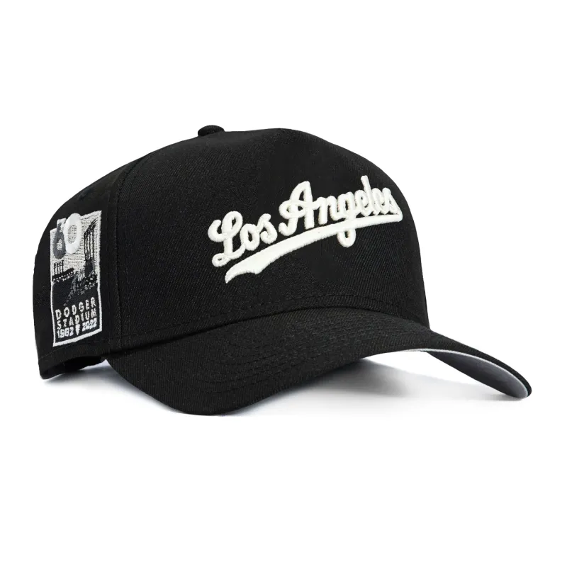 New Era 9Forty GITD A-Frame Los Angeles Dodgers 60th Anniversary Stadium Patch Snapback Script Hat - Black, White sold by Hat Club