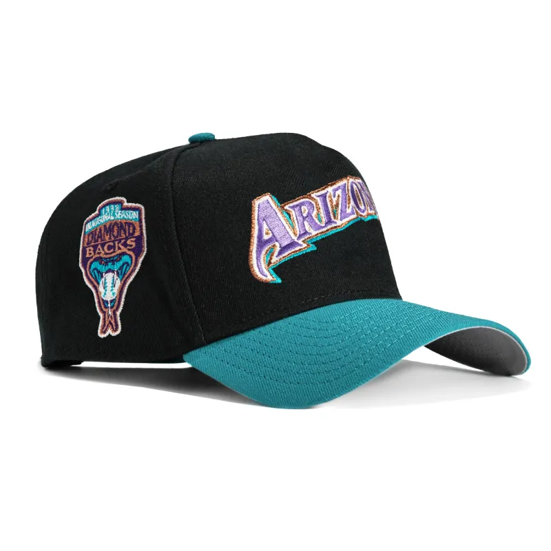 New Era 9Forty A-Frame Arizona Diamondbacks Inaugural Patch Word Snapback Hat - Black, Teal sold by Hat Club