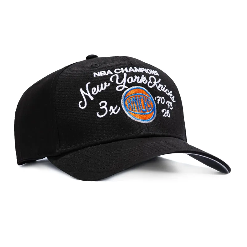 Mitchell & Ness New York Knicks 3x NBA Champions Patch Script Snapback Hat - Black made by Mitchell & Ness