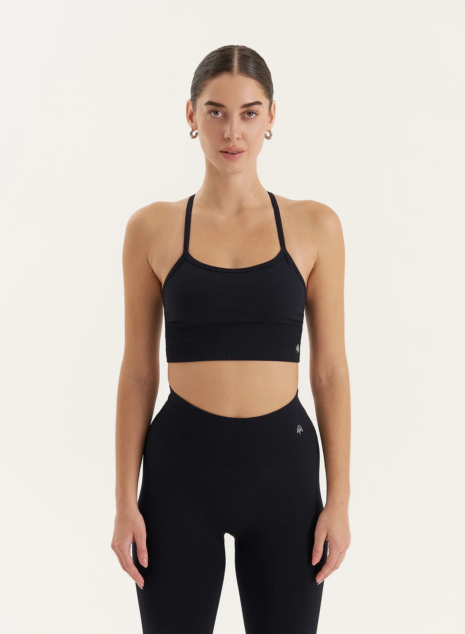Black Racer Back Seamless Sports Bra sold by 4th and Reckless