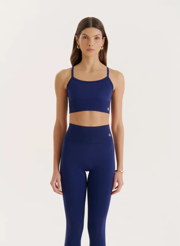 Navy Racer Back Seamless Sports Bra sold by 4th and Reckless