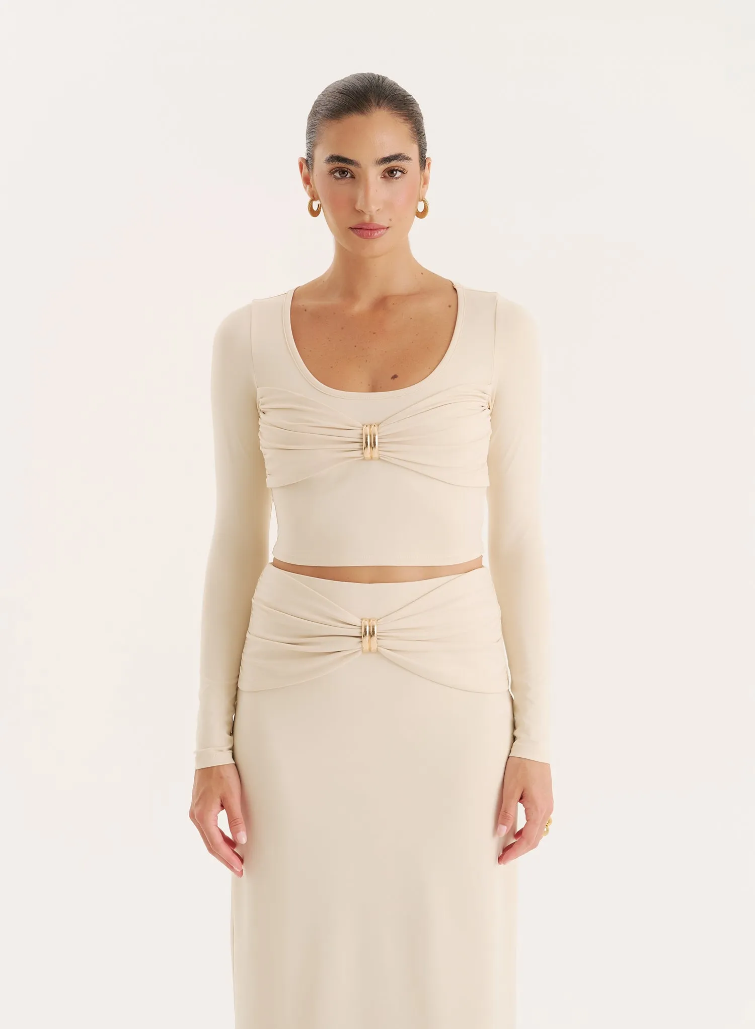 Cream Bust Detail Long Sleeve Cropped Top sold by 4th and Reckless