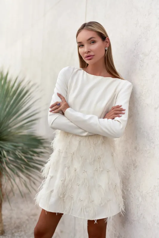 The Perla Dress sold by Anne Louise Boutique