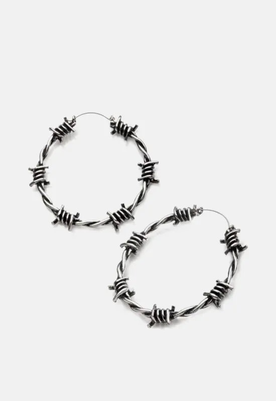 Barbed Wire Burnished Plug Hoops sold by Damaged Society