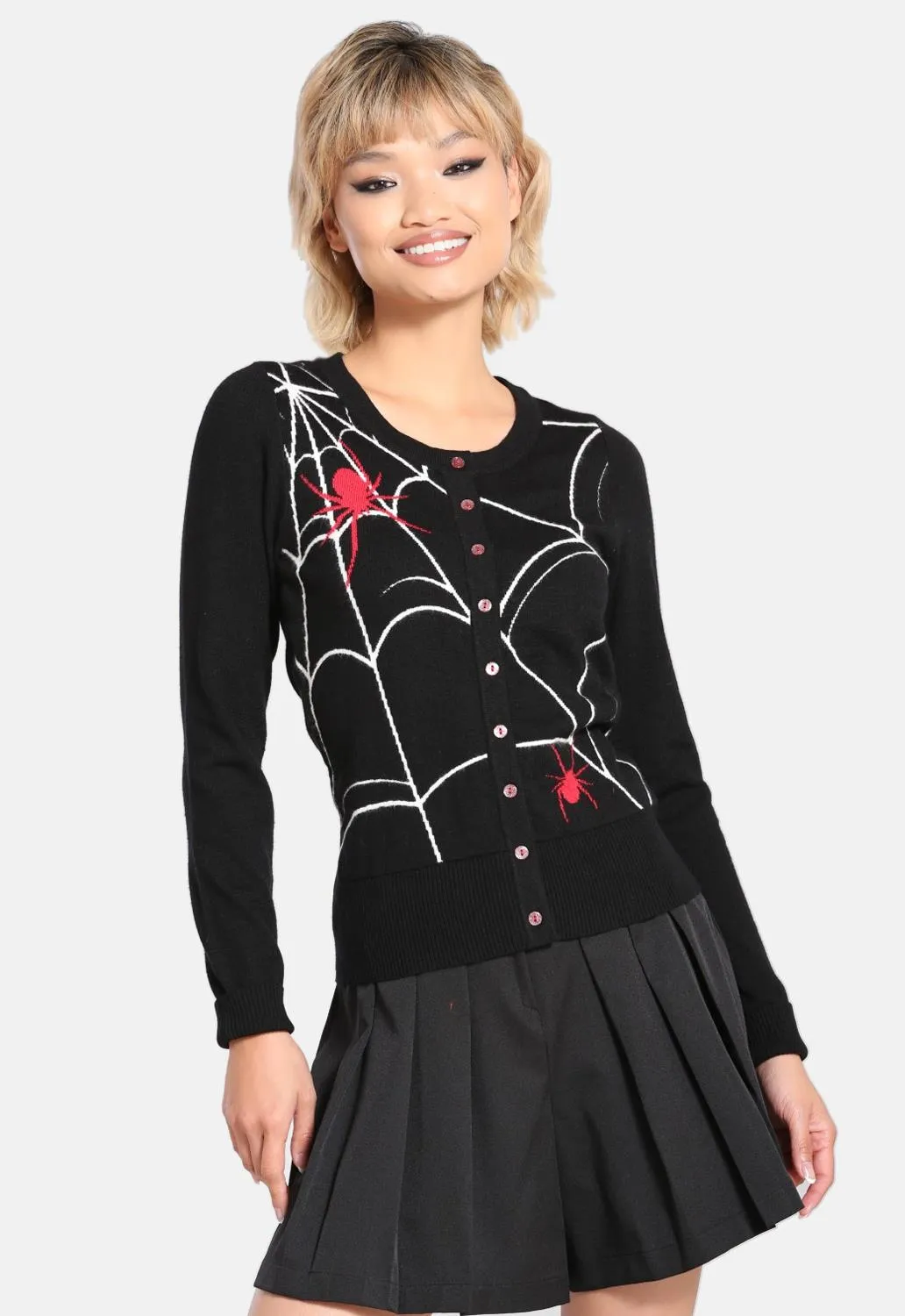 In A Web Cardigan sold by Damaged Society