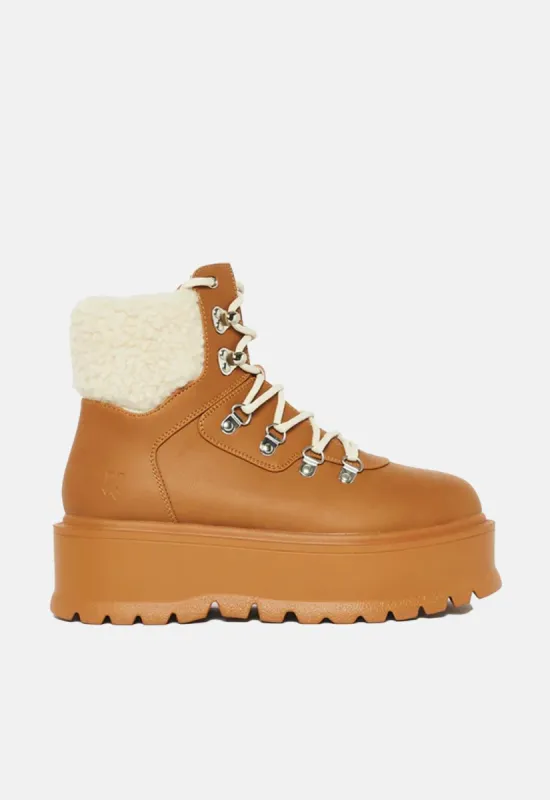 Kaldor Beige Fur Platform Boots sold by Damaged Society