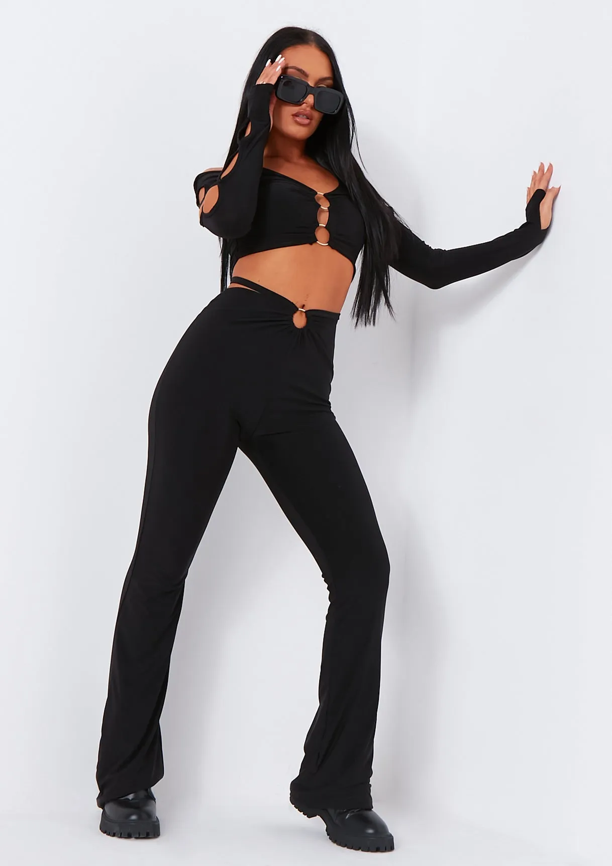 Trisha Black Ring Detail Waist Strap Flared Trouser sold by Missy Empire