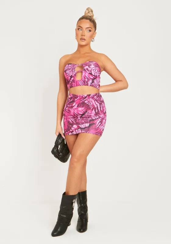 Devika Pink Slinky Printed Cut Out Mini Skirt sold by Missy Empire