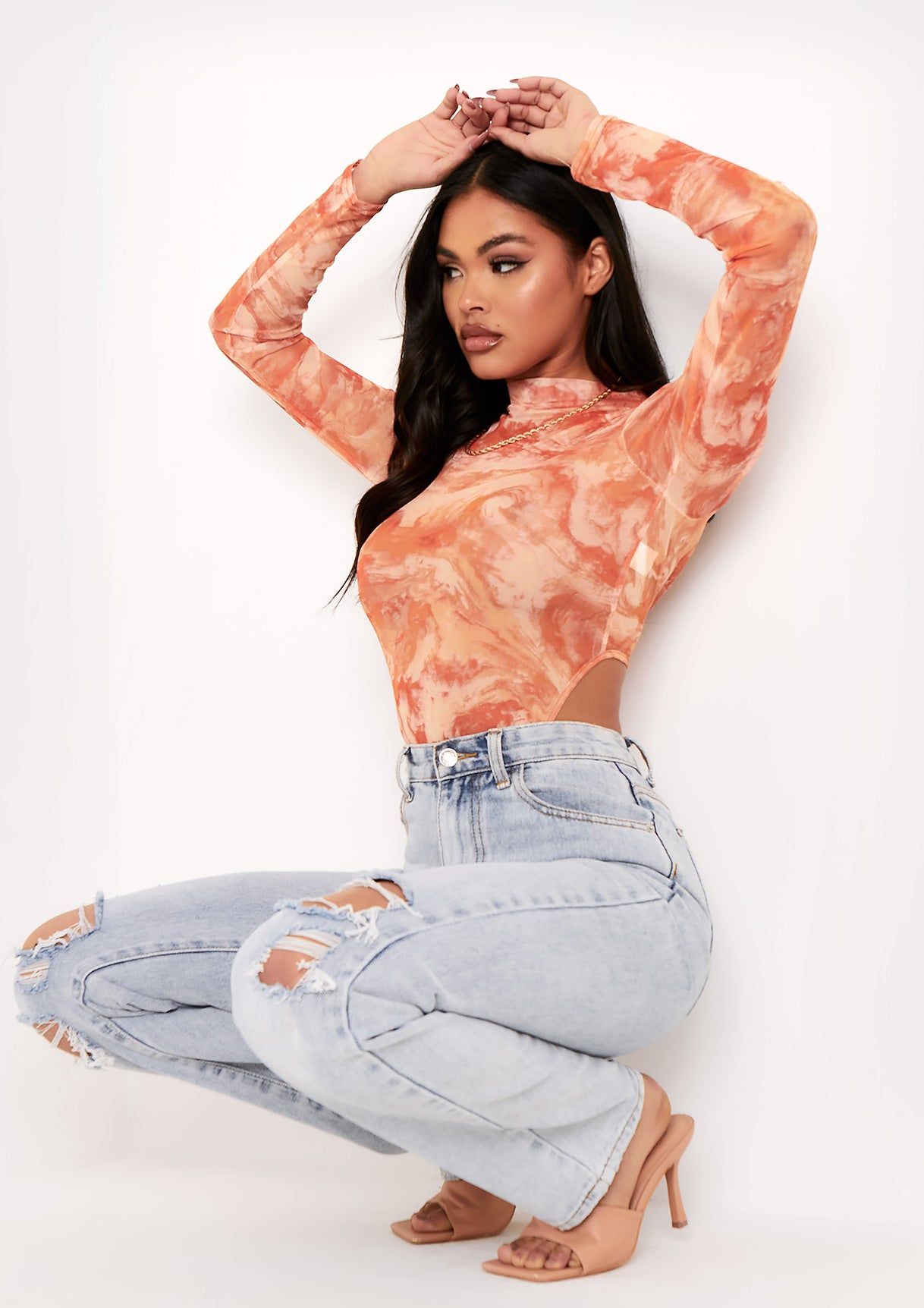 Lekka Orange Marble Print High Neck Long Sleeve Bodysuit sold by Missy Empire