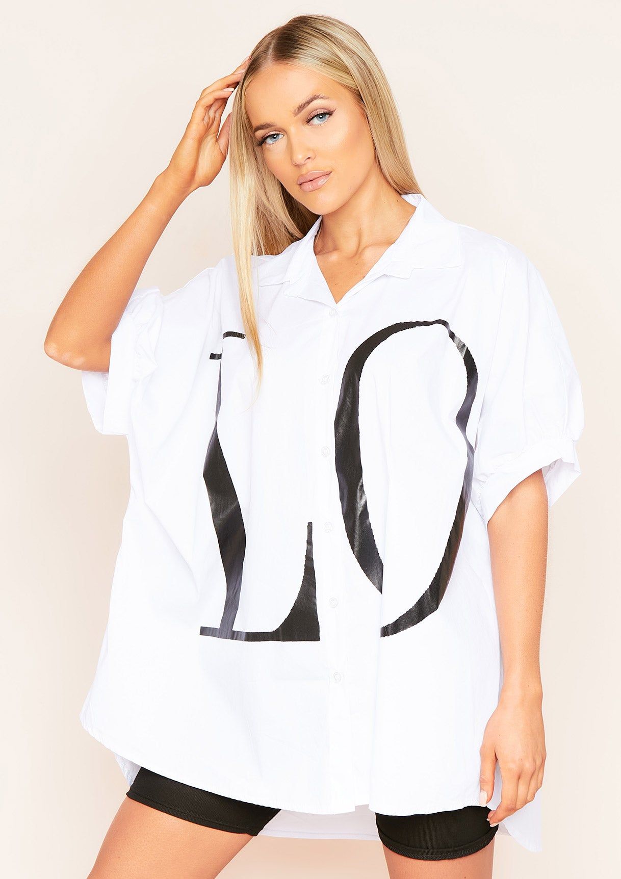 Kacey White L.O.V.E Oversized Casual Shirt sold by Missy Empire