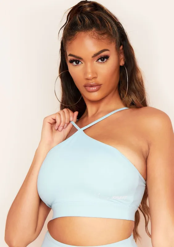 Ava Pastel Blue Missy Sport Cross Strap Halterneck Gym Crop Top sold by Missy Empire