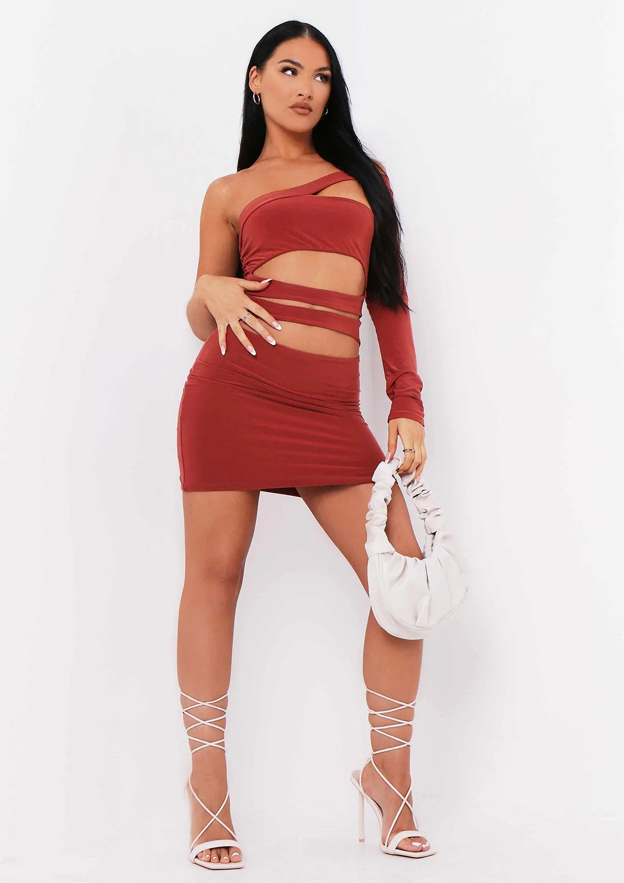 Cambria Burnt Orange One Sleeve Cut Out Mini Dress sold by Missy Empire