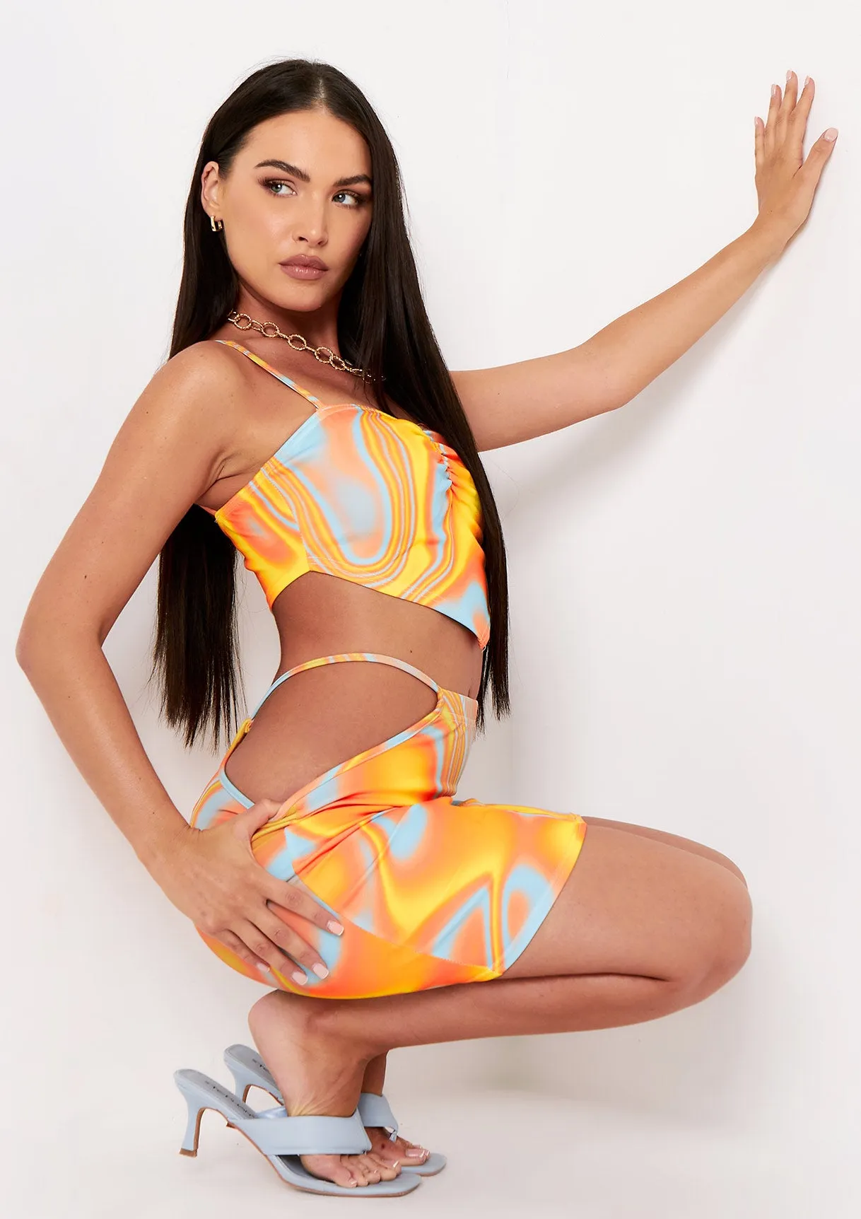 Verity Orange Swirl Print Cut Out Strap Detail Mini Skirt sold by Missy Empire product image thumbnail 2