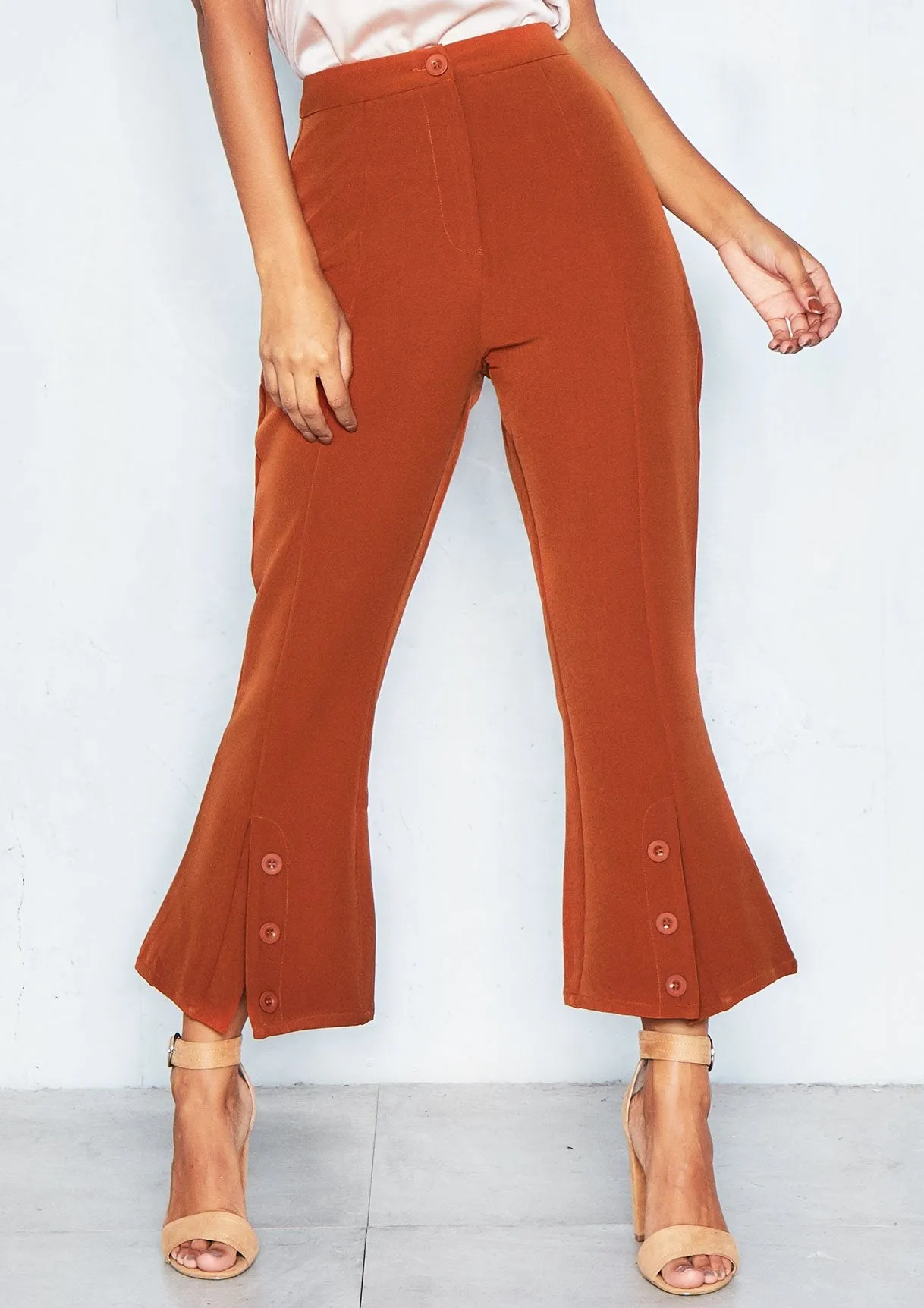 Lupita Rust Split Front Flare Trousers sold by Missy Empire