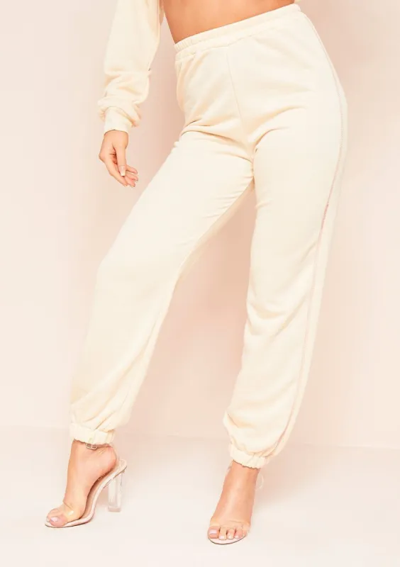 Eve Cream Contrast Stitch Joggers made by Missy Empire