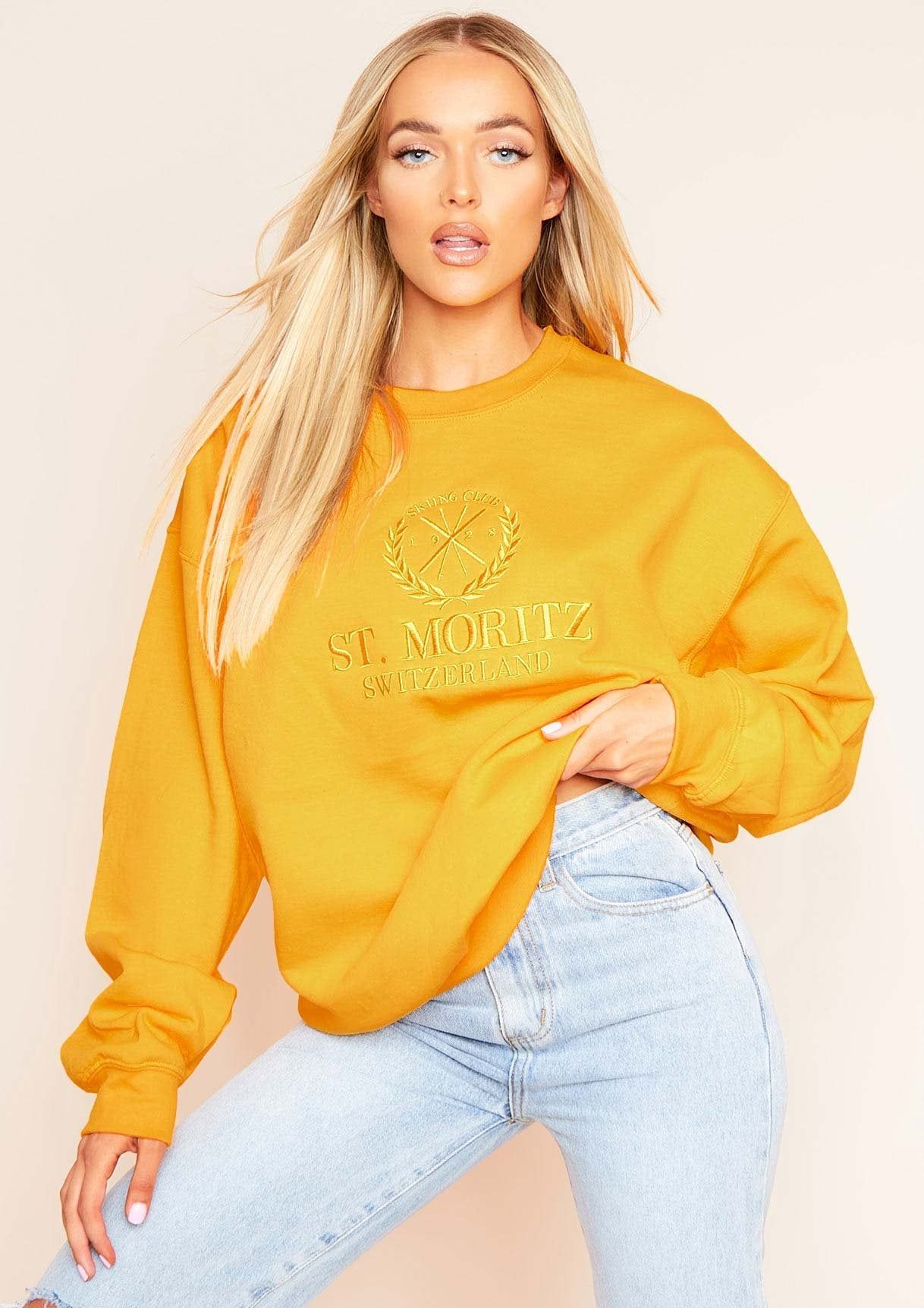 Halyn Bright Gold St. Moritz Slogan Oversized Sweatshirt sold by Missy Empire