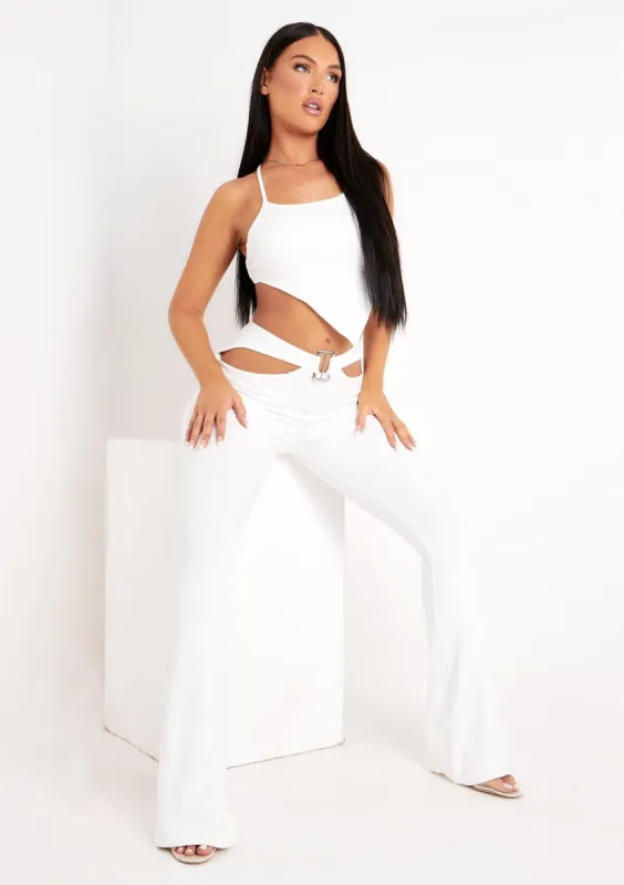 Mindy Ivory Buckle Front Cut Out Flared Trousers sold by Missy Empire