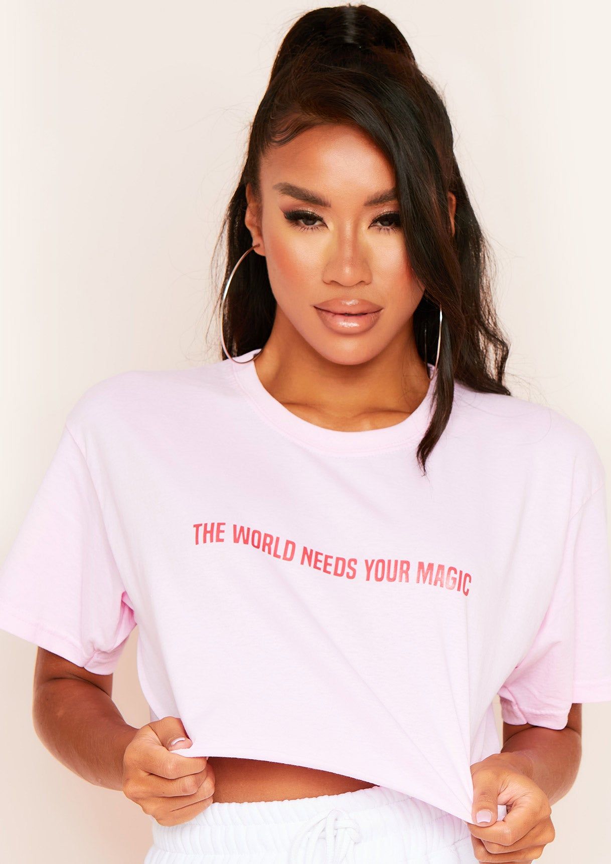 Amica Pink The World Needs Your Magic Slogan Cropped T-Shirt sold by Missy Empire