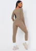 Eli Olive Plunge Ribbed Seamless Long Sleeve Jumpsuit sold by Missy Empire