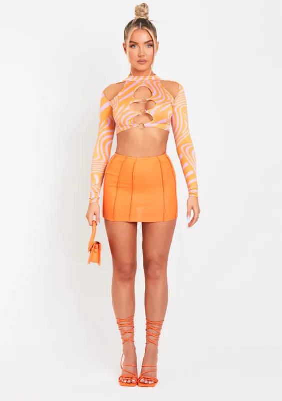 Keeley Pink Swirl Print Cut Out Long Sleeve Crop Top sold by Missy Empire