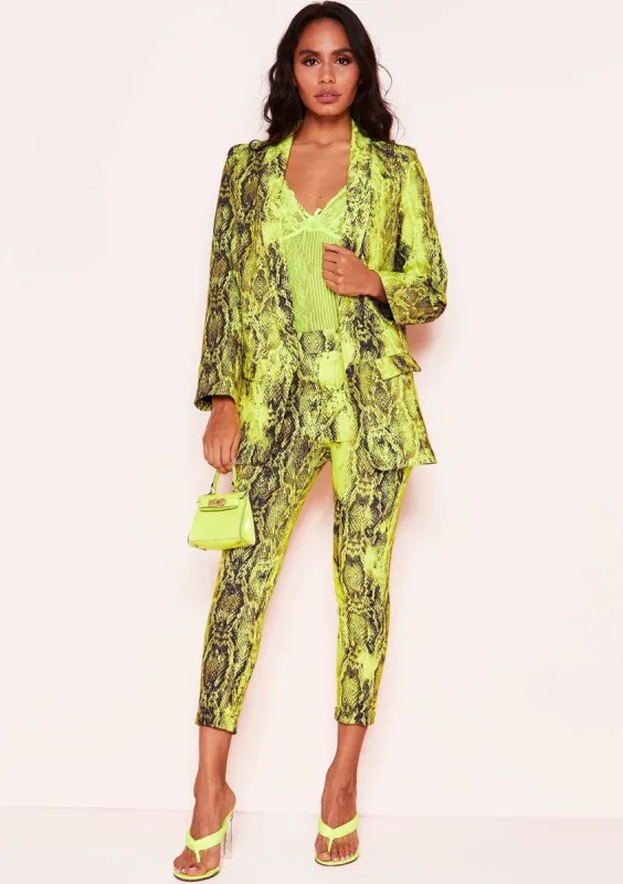 Rachel Neon Yellow Snake Print Trousers sold by Missy Empire