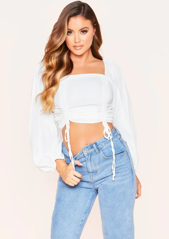 Izzy White Ruched Tie Long Puff Sleeve Crop Top sold by Missy Empire